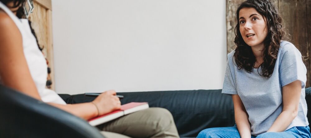 A women in a therapy session. 