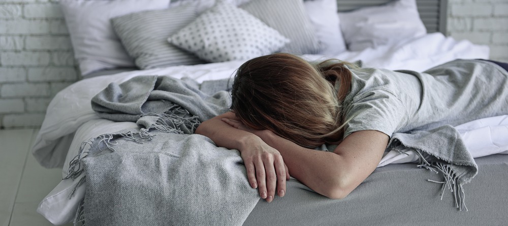 Women lying in bed