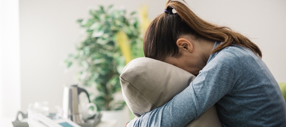 A woman feeling negative and tired. 