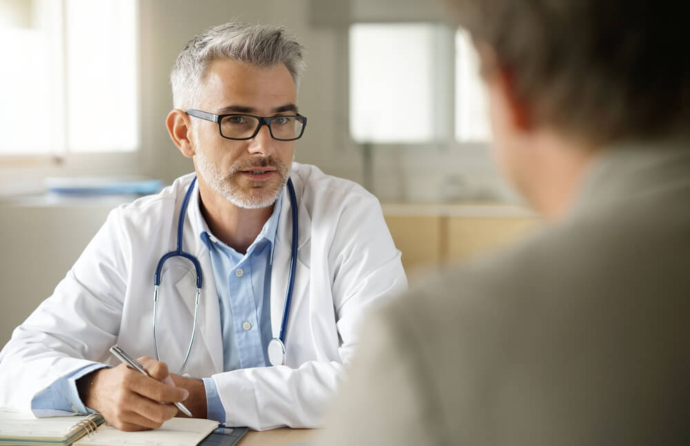 Patient and doctor having a conversation about treatment