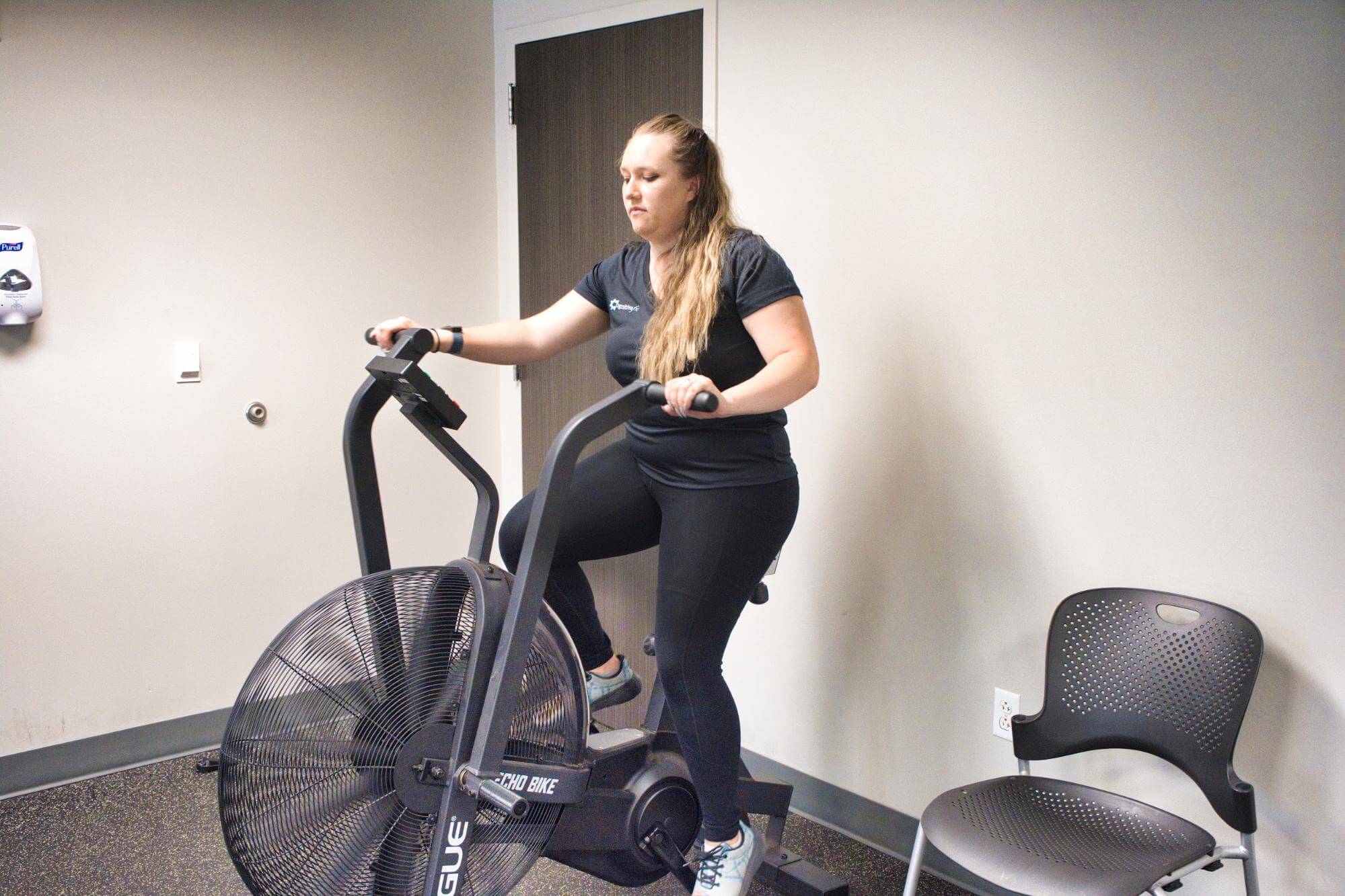 Patient doing cardio before therapy exercises. 