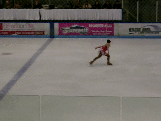 Figure skating concussions were behind this athlete's 14-year battle with chronic illness. This GIF shows Olivia doing a side layback spin during  a competition in 2007.