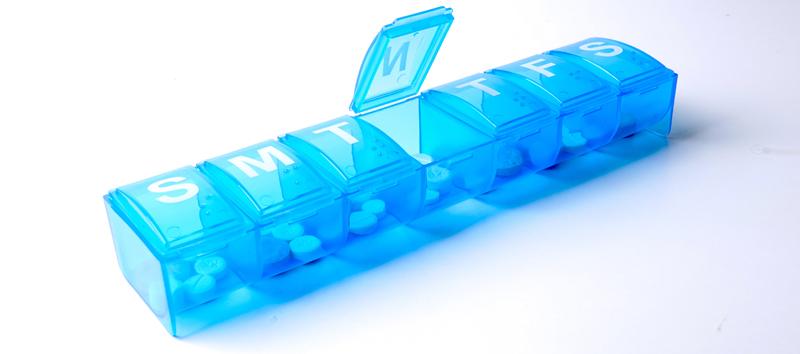 A photo of a pill organizer box
