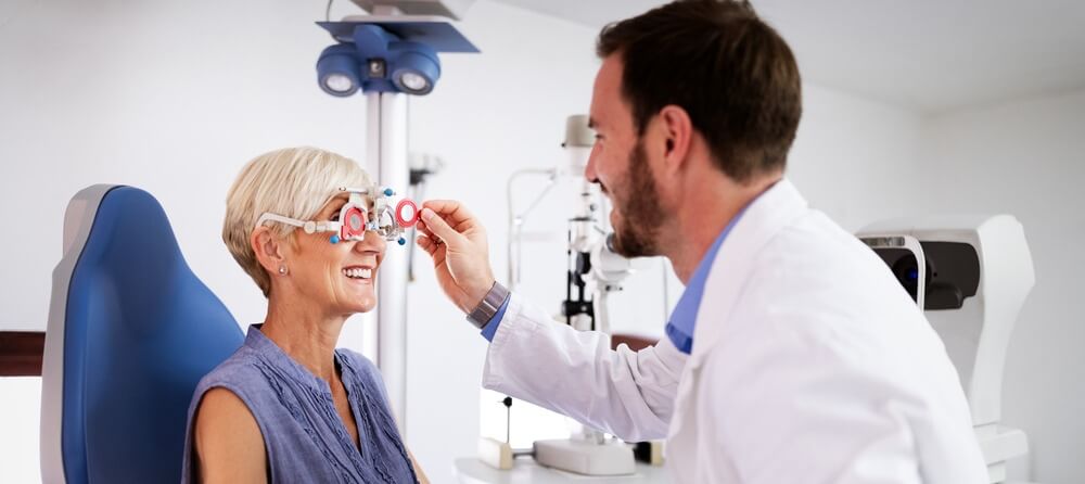Women getting an optometry exam. 