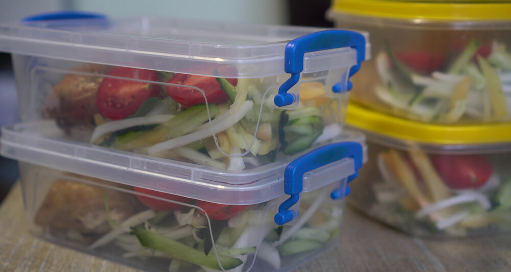 Premade salads in several containers.