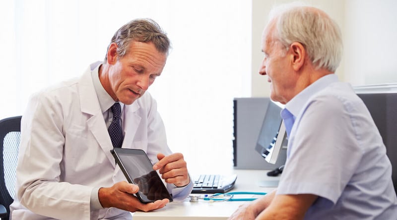 A doctor and patient in a consultation.