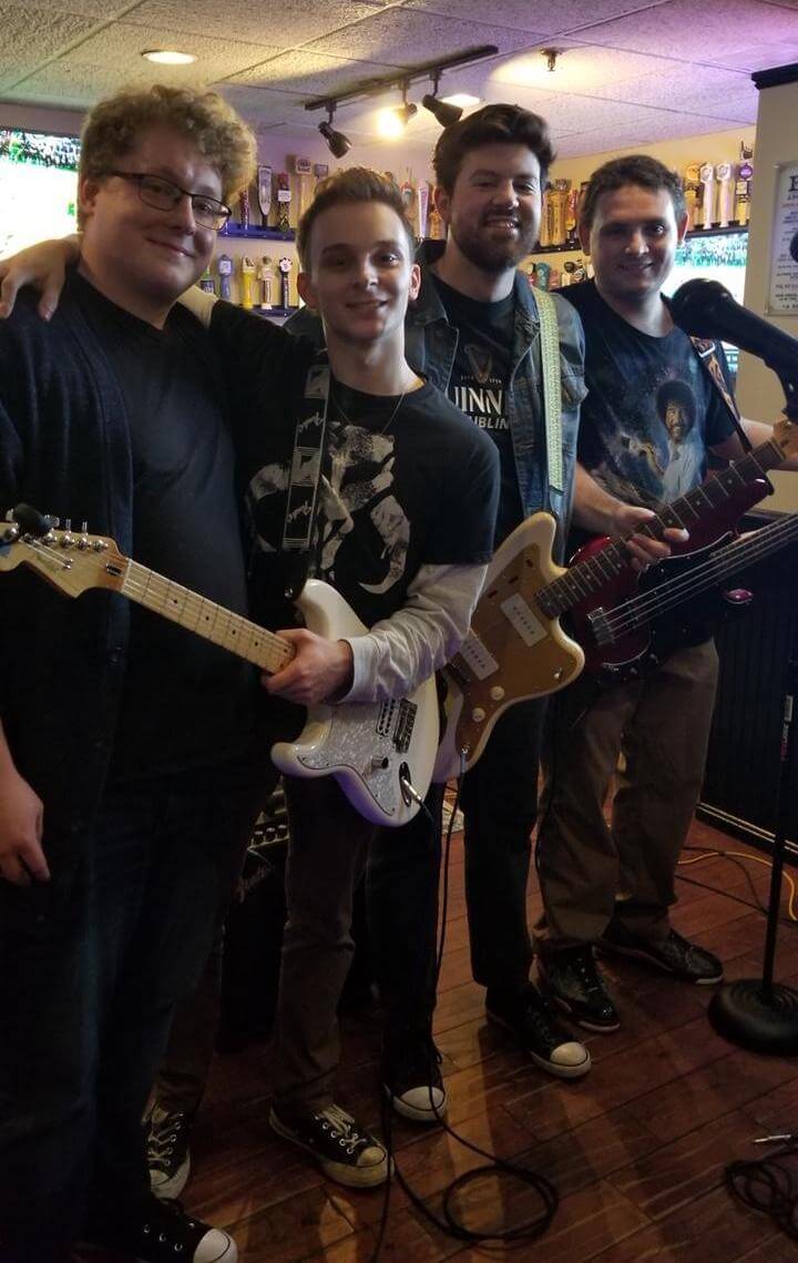 A photo of Chris and his band after the show.