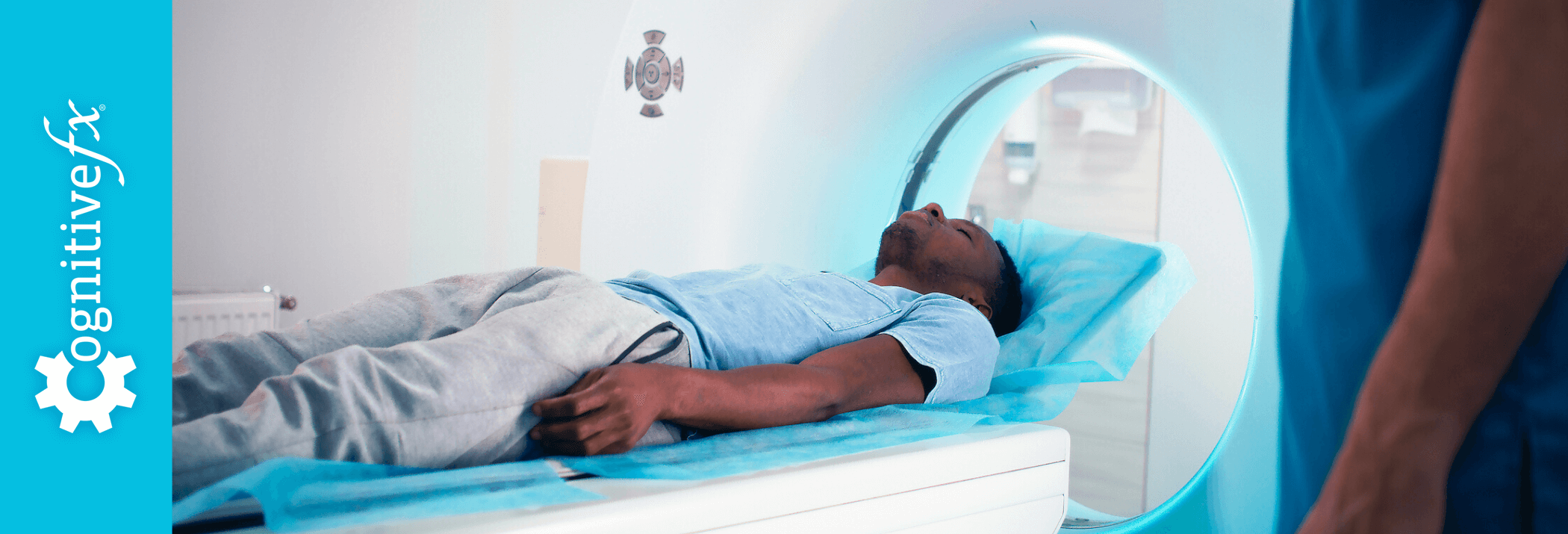 Doctor Shows The Process Of Scanning A Patient Stock Photo